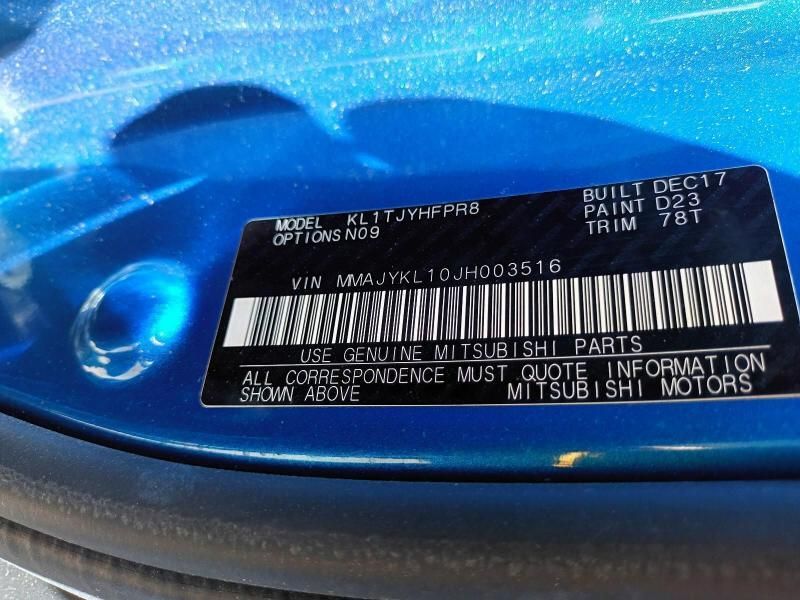 A Blue Car With a License Plate That Says Mitsubishi Parts — South West 4WD Wreckers In Brisbane, QLD