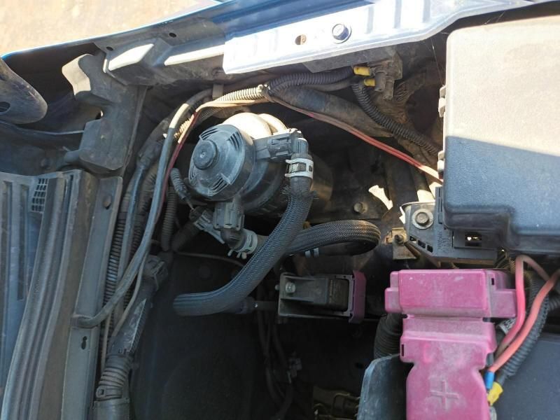 A Close Up of a Car Engine With a Pink Fuse Box — South West 4WD Wreckers In Brisbane, QLD