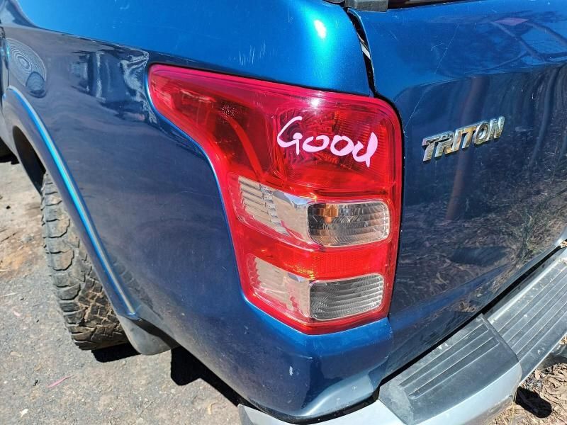 A Blue Truck With a Red Tail Light That Says Good on It — South West 4WD Wreckers In Brisbane, QLD