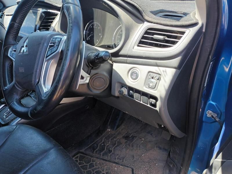 The Interior of a Blue Car With a Steering Wheel and Dashboard — South West 4WD Wreckers In Brisbane, QLD