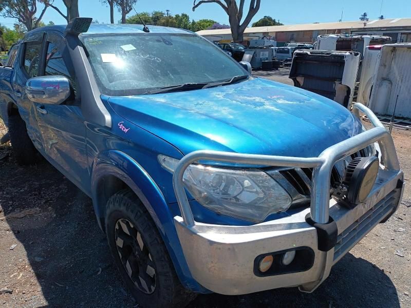 A Blue Pickup Truck is Parked in a Parking Lot — South West 4WD Wreckers In Brisbane, QLD