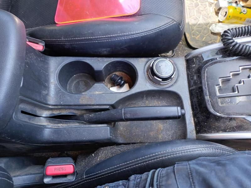 A Person is Sitting in the Driver 's Seat of a Car — South West 4WD Wreckers In Brisbane, QLD