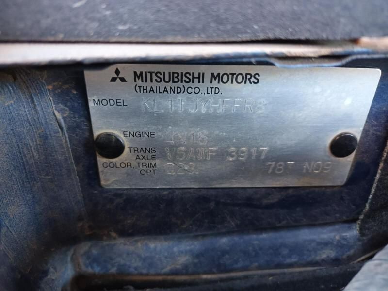 A Close Up of a Mitsubishi Motors License Plate — South West 4WD Wreckers In Brisbane, QLD