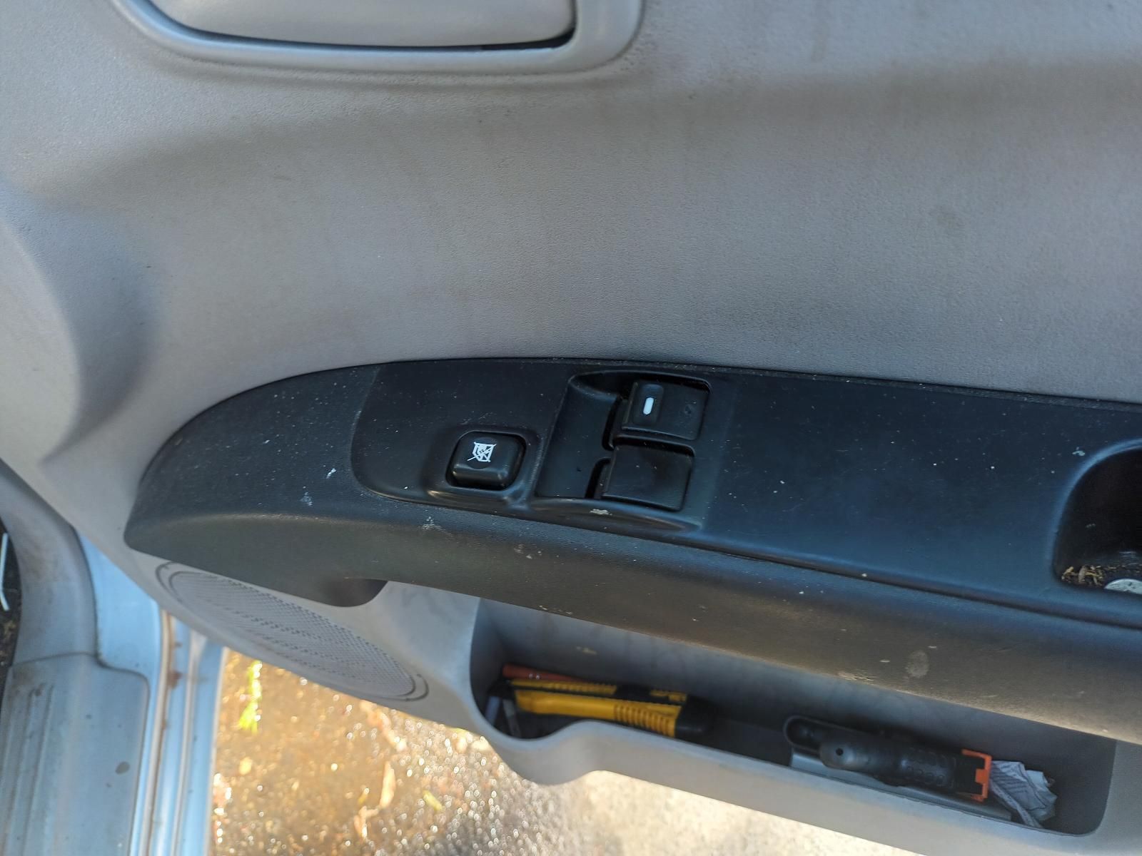 A Close Up of a Car Door With a Window Switch — South West 4WD Wreckers In Brisbane, QLD