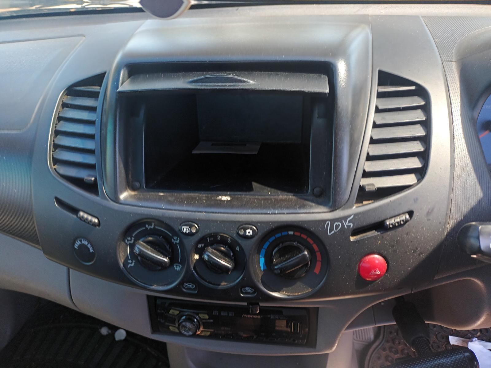 A Car Dashboard With a Red Button That Says Love — South West 4WD Wreckers In Brisbane, QLD