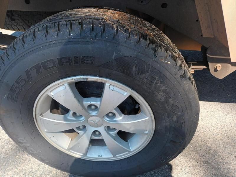 A Close Up of a Tire on a Silver Rim — South West 4WD Wreckers In Brisbane, QLD