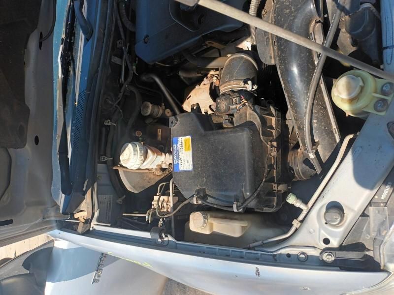 A Close Up of a Car Engine With the Hood Open — South West 4WD Wreckers In Brisbane, QLD