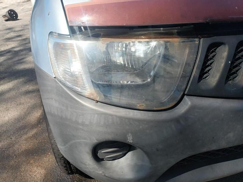 A Close Up of a Cars Headlight on a Road — South West 4WD Wreckers In Brisbane, QLD