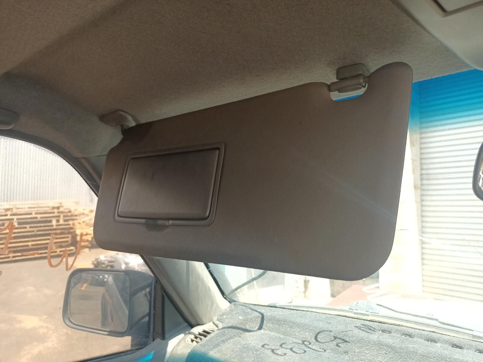 A Sun Visor is Attached to the Ceiling of a Car — South West 4WD Wreckers In Brisbane, QLD