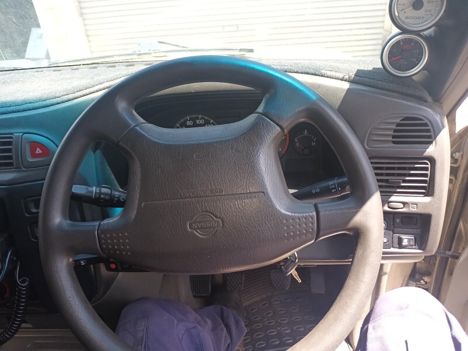 A Steering Wheel with a Nissan Logo on It — South West 4WD Wreckers In Brisbane, QLD