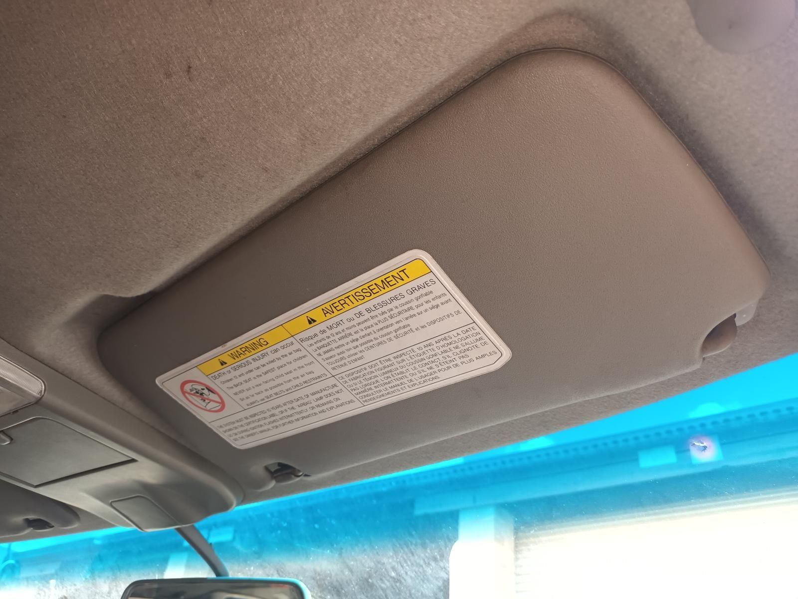 A Sun Visor is Hanging from the Ceiling of a Car — South West 4WD Wreckers In Brisbane, QLD