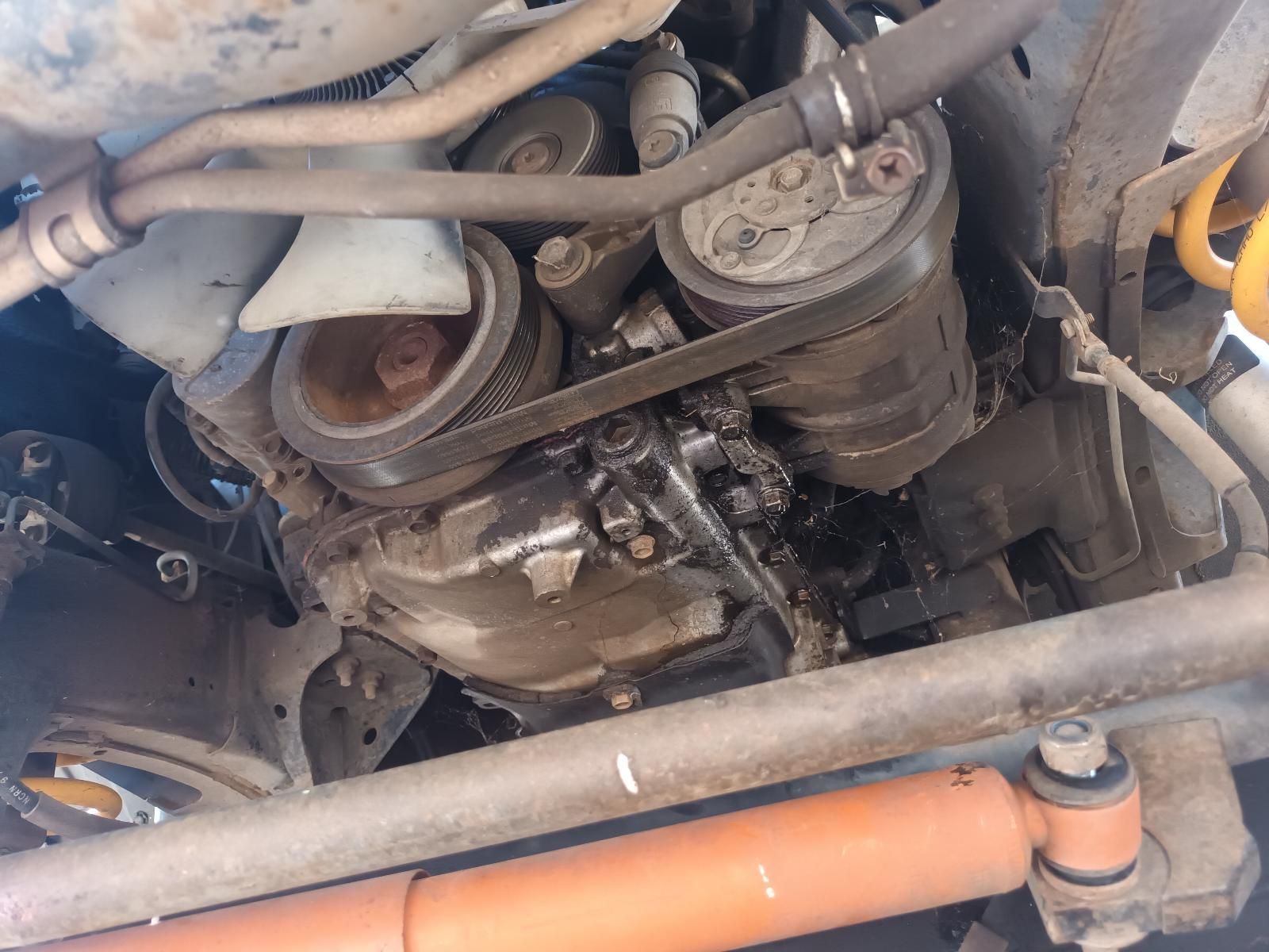 A Close Up of a Car Engine with a Belt on It — South West 4WD Wreckers In Brisbane, QLD