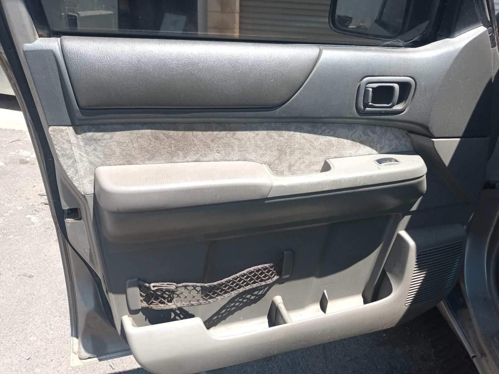 A Close Up of a Car Door with the Door Open — South West 4WD Wreckers In Brisbane, QLD
