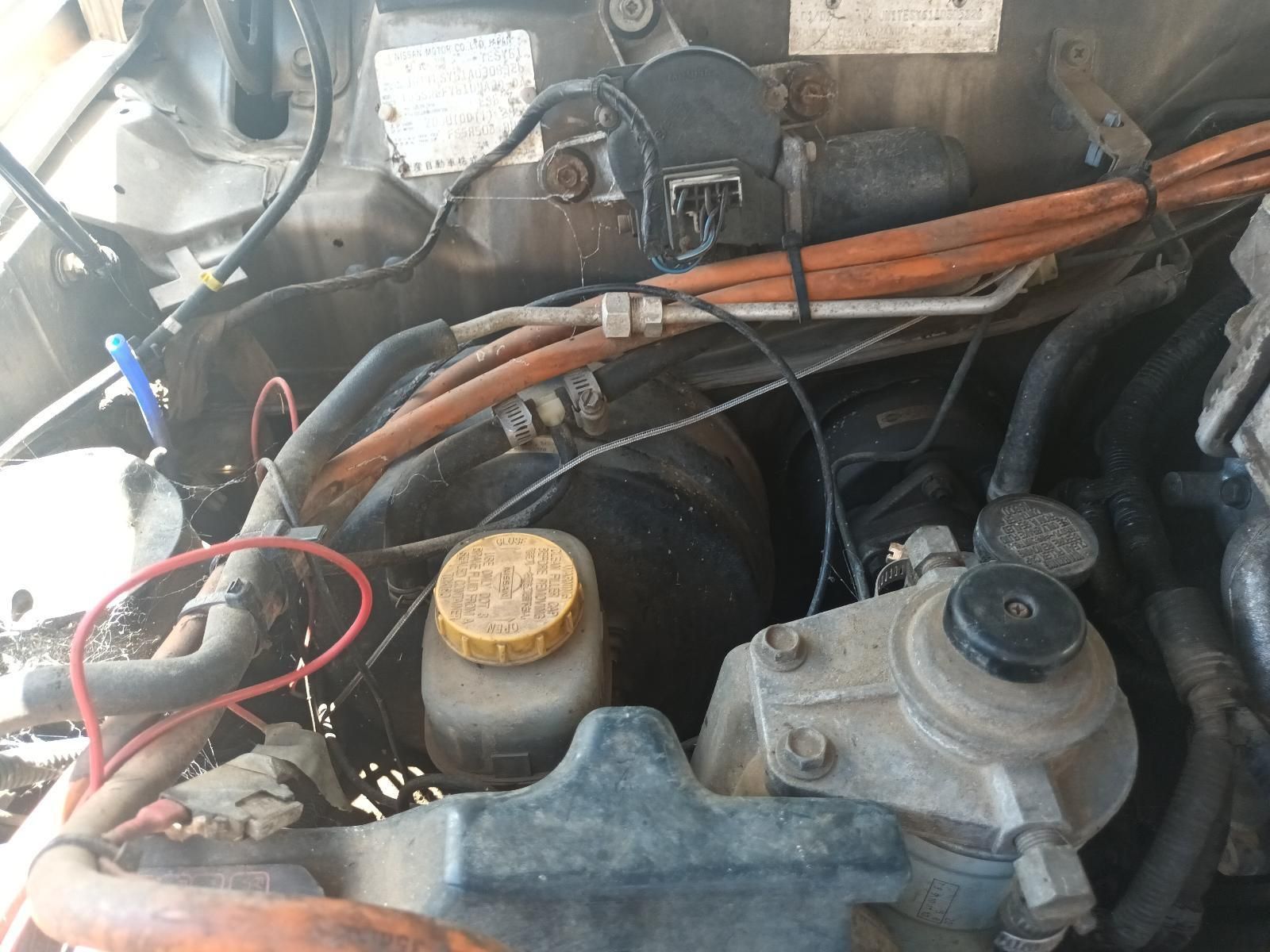 A Close Up of a Car Engine with a Yellow Cap on It — South West 4WD Wreckers In Brisbane, QLD