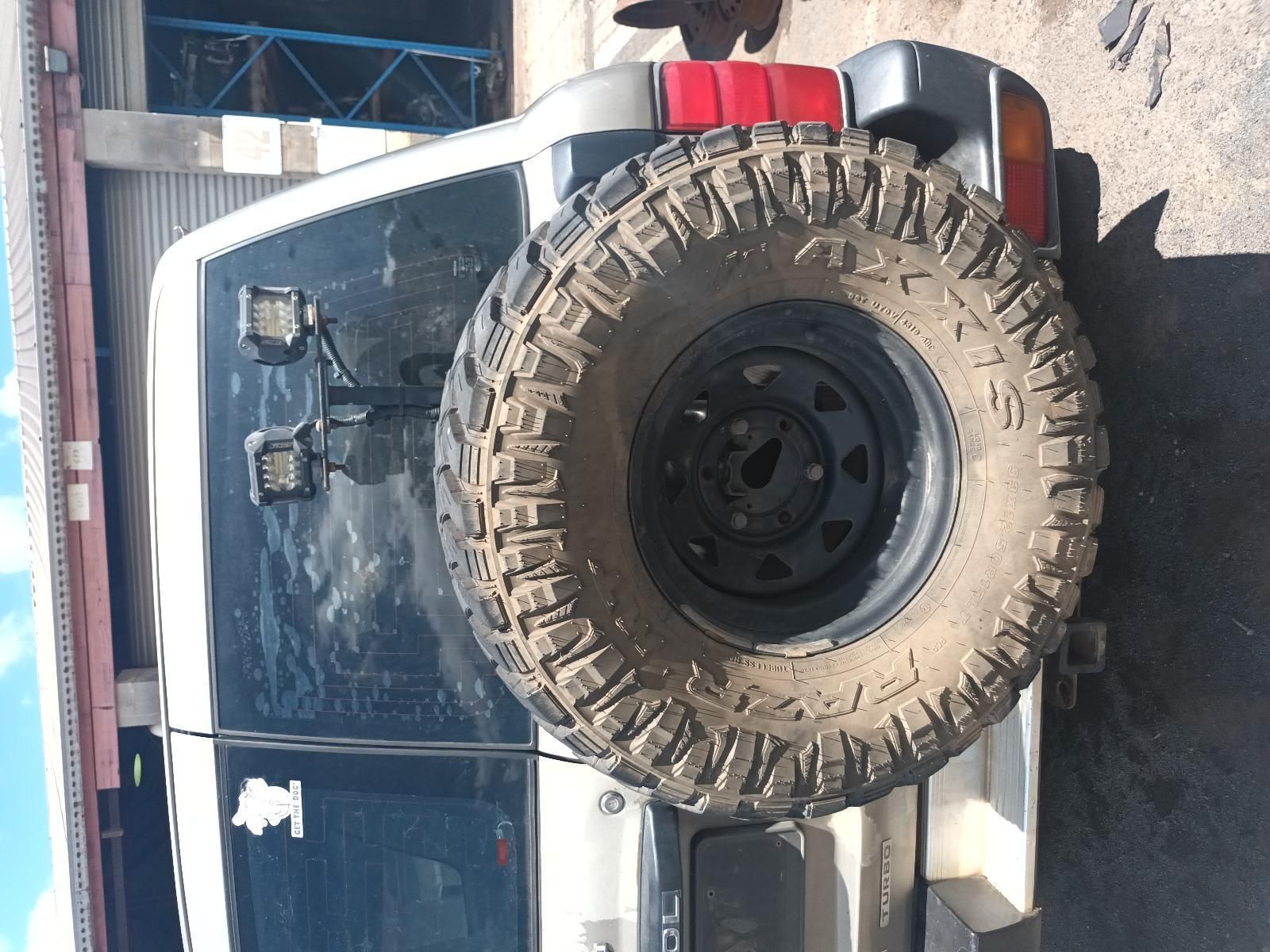 A Jeep with a Spare Tire on the Back of It — South West 4WD Wreckers In Brisbane, QLD