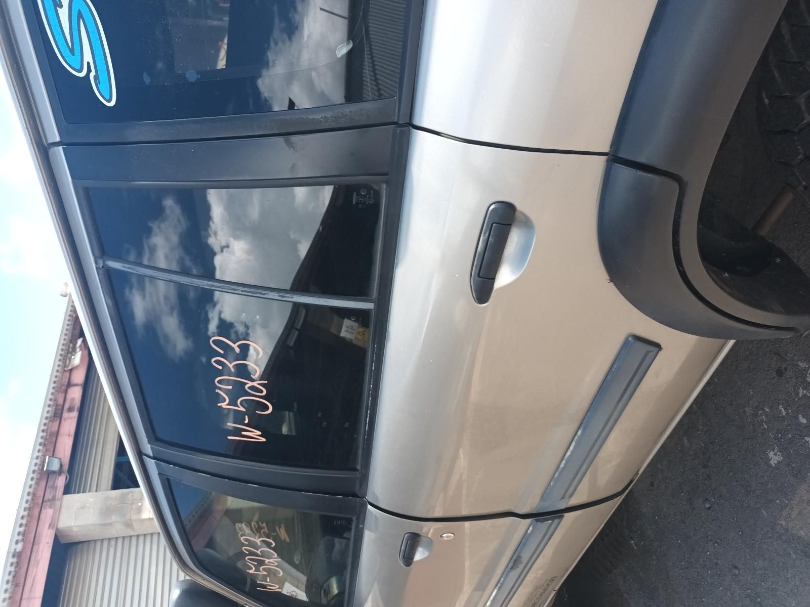 A Silver Car with the Words on the Side of It — South West 4WD Wreckers In Brisbane, QLD