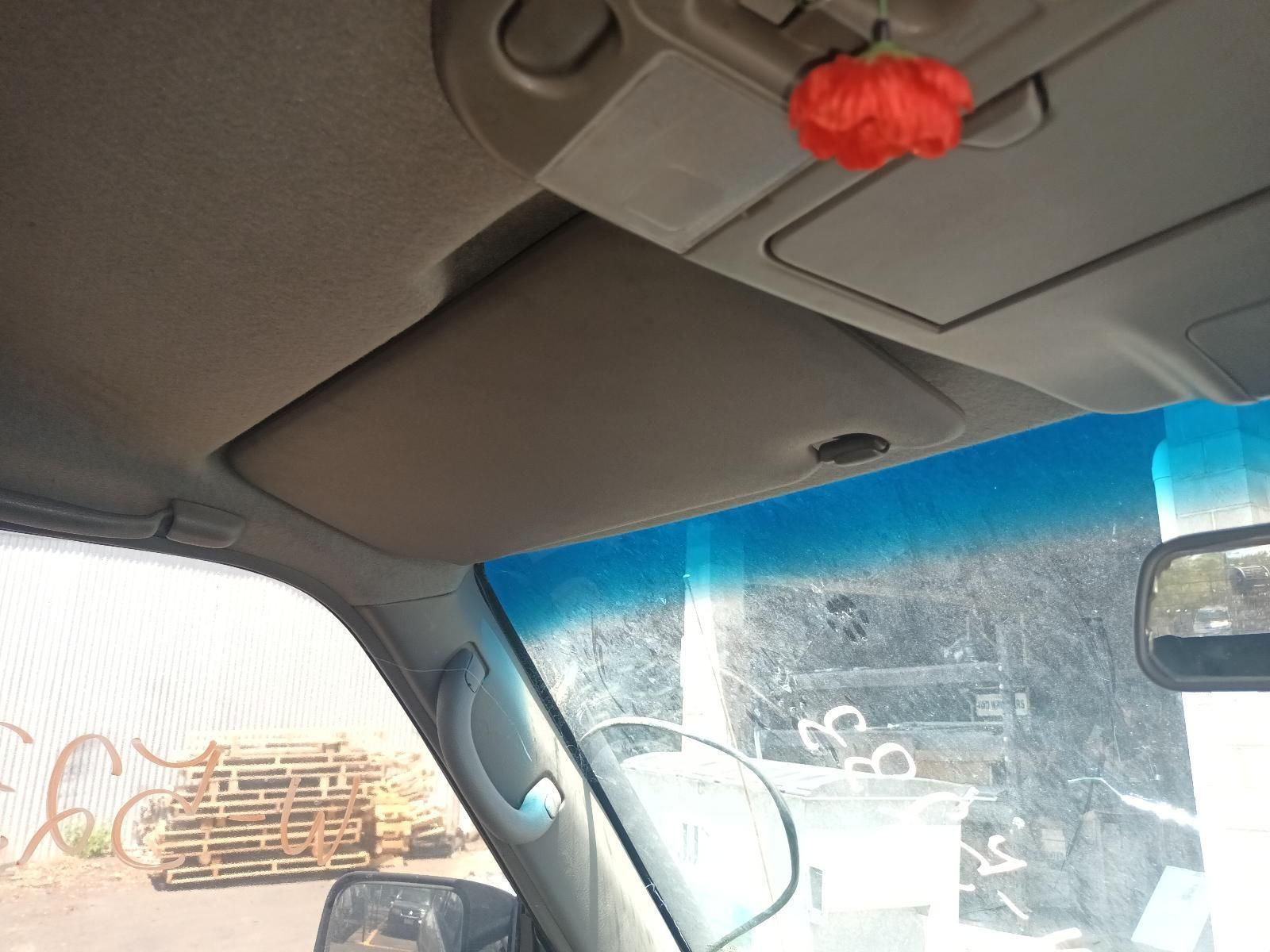 The Roof of a Car Has a Red Flower on It — South West 4WD Wreckers In Brisbane, QLD