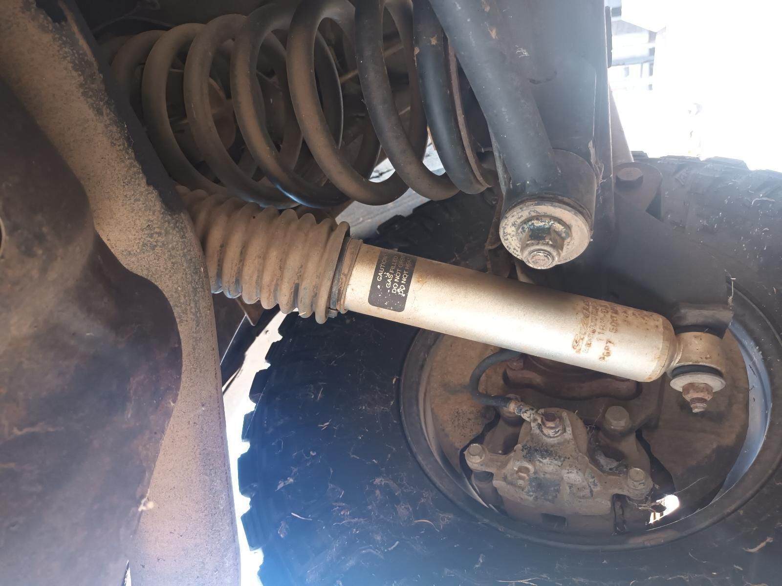 A Close Up of a Shock Absorber on a Car — South West 4WD Wreckers In Brisbane, QLD
