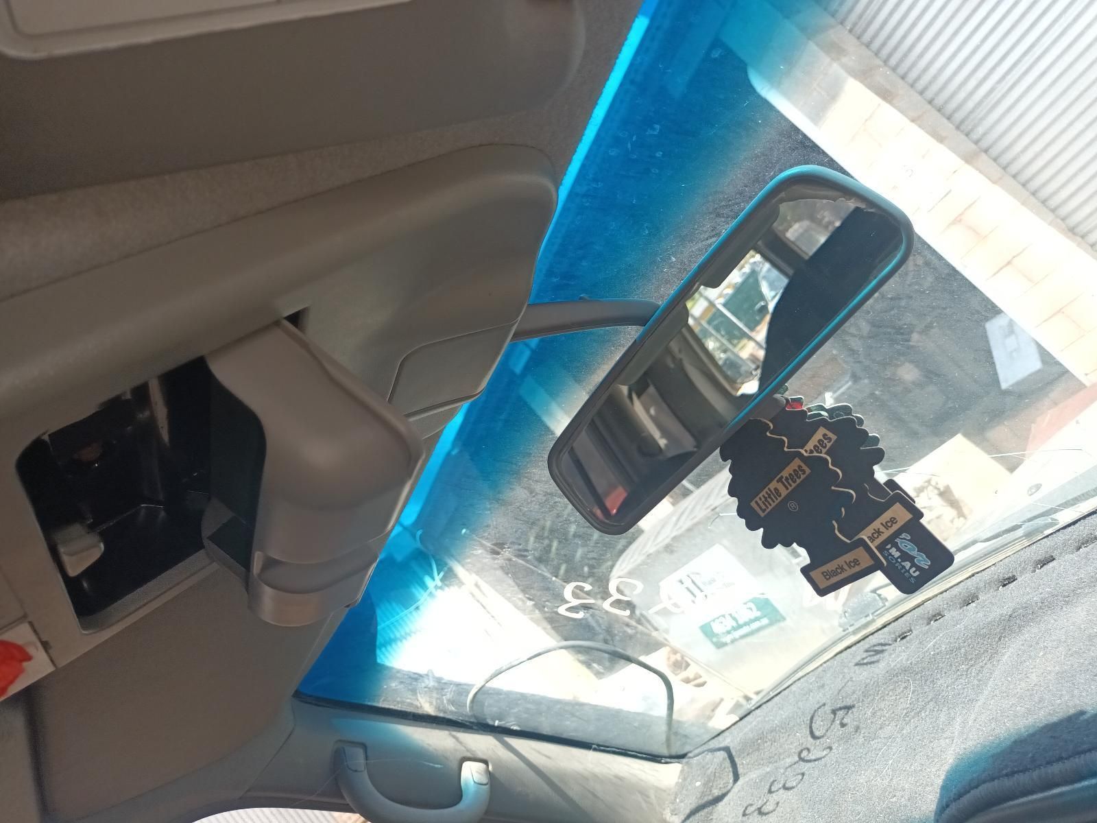 A Car with a Rear View Mirror and an Air Freshener on the Windshield — South West 4WD Wreckers In Brisbane, QLD