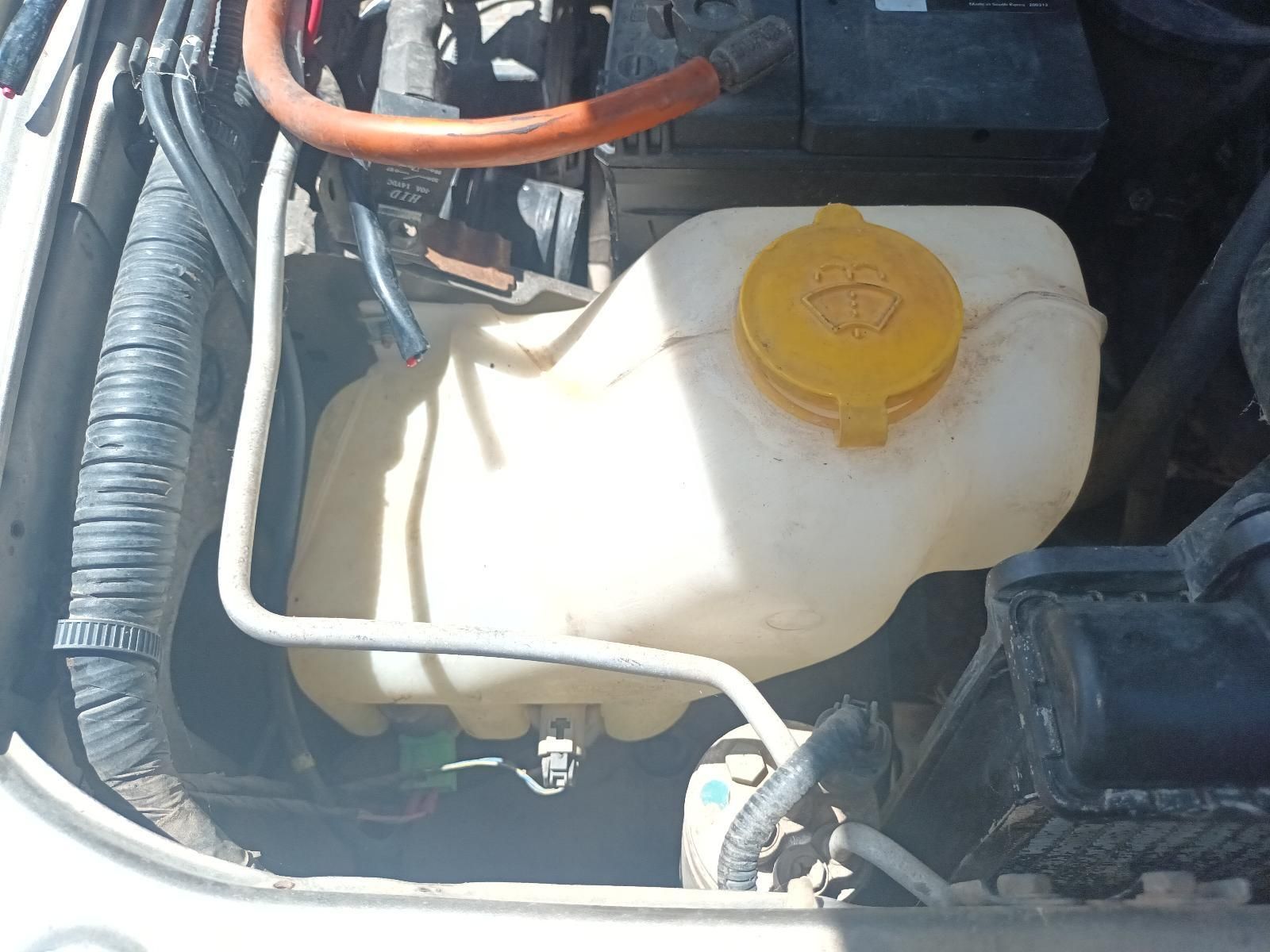 A Close Up of a Car Engine with a Yellow Cap on It — South West 4WD Wreckers In Brisbane, QLD
