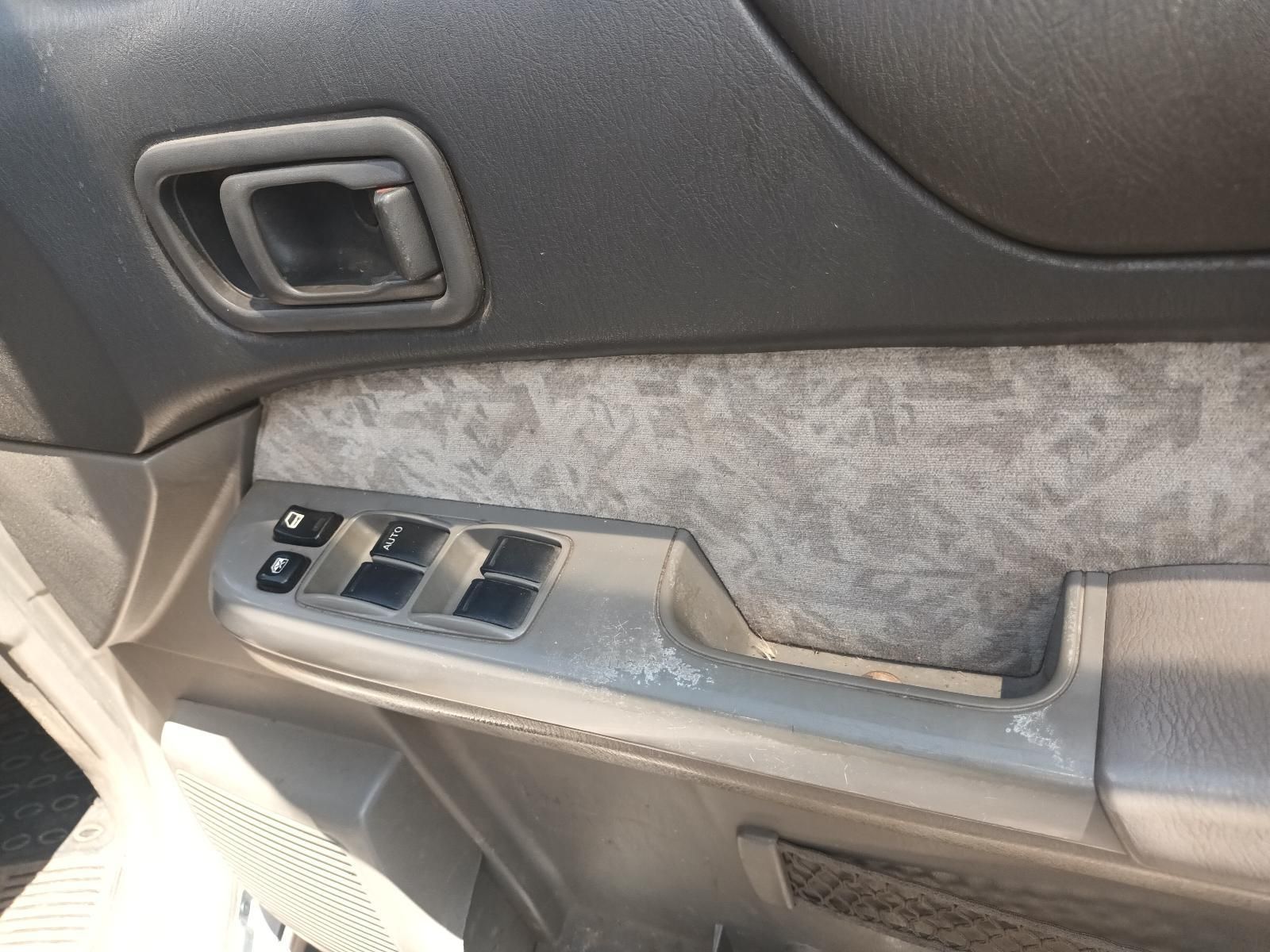 A Close Up of a Car Door with a Handle and Buttons — South West 4WD Wreckers In Brisbane, QLD