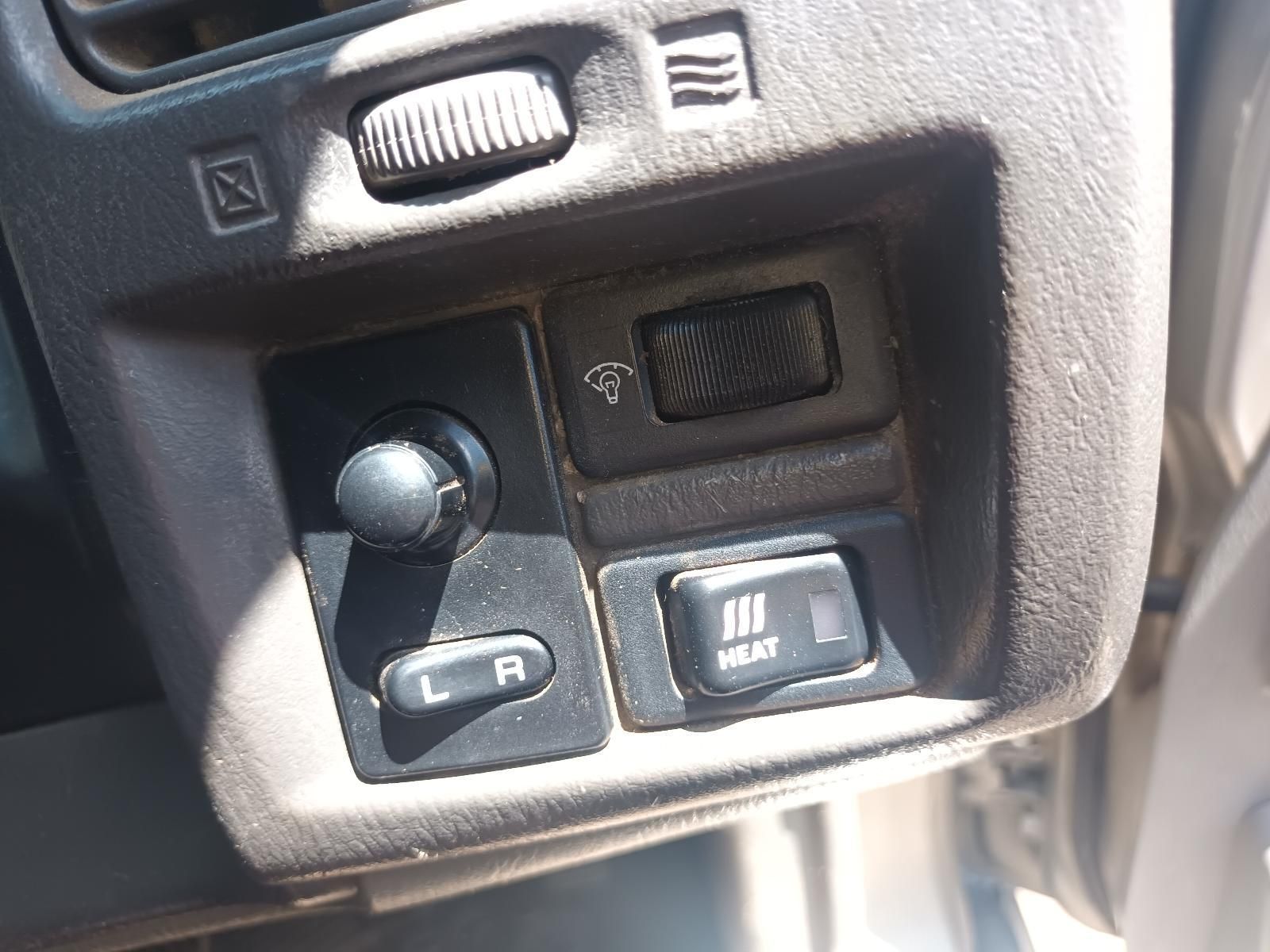 A Close Up of a Car Dashboard with a Switch That Says Next on It — South West 4WD Wreckers In Brisbane, QLD