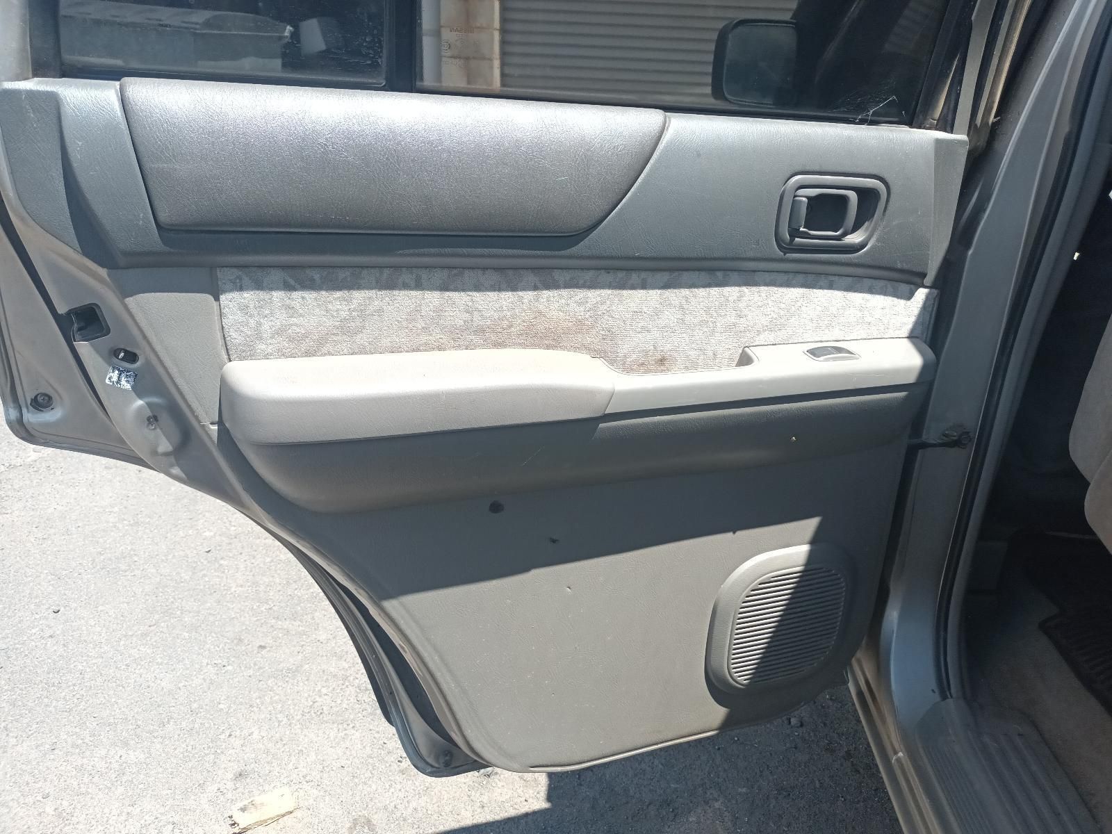 The Back Door of a Car is Open on the Side of the Road — South West 4WD Wreckers In Brisbane, QLD