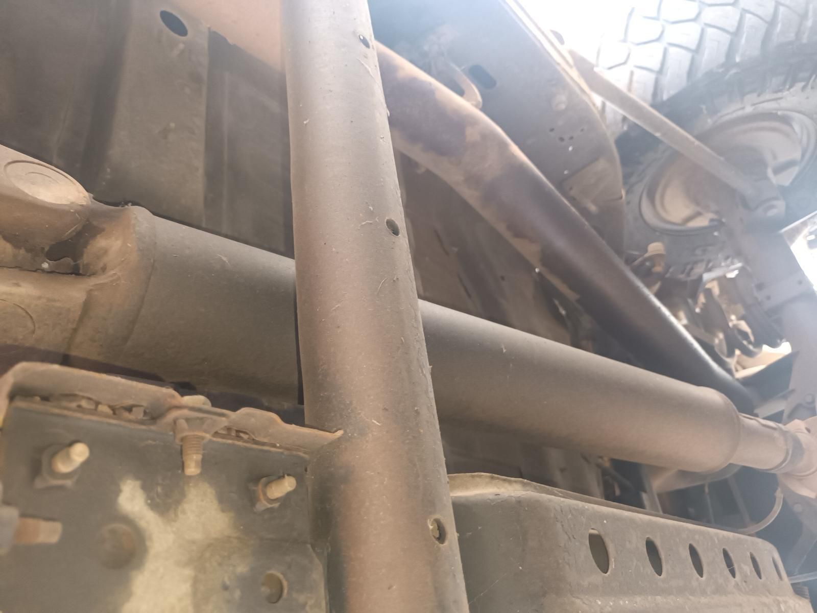 A Close Up of the Underside of a Truck with a Ladder Attached to It — South West 4WD Wreckers In Brisbane, QLD