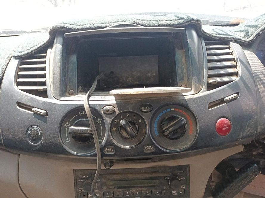 A Dirty Dashboard of a Car With a Radio Missing — South West 4WD Wreckers In Brisbane, QLD
