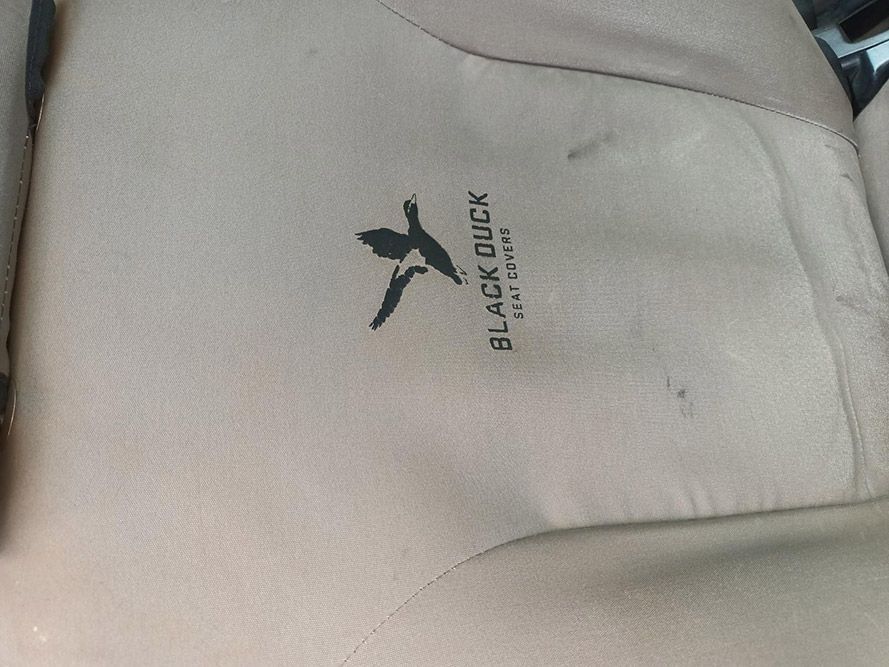 A Car Seat With a Black Duck Logo on It — South West 4WD Wreckers In Brisbane, QLD