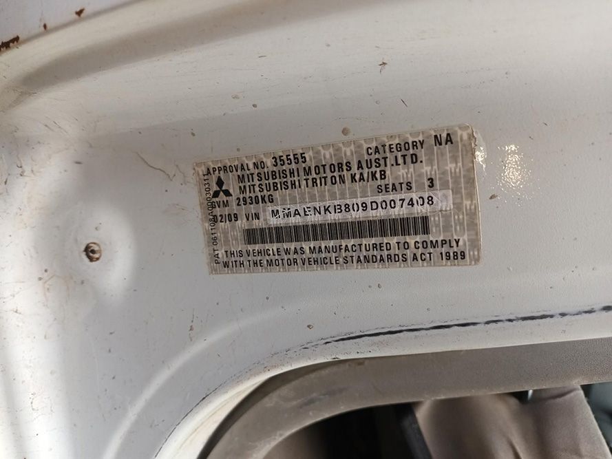 A Close Up of a White Car With a Sticker on It — South West 4WD Wreckers In Brisbane, QLD