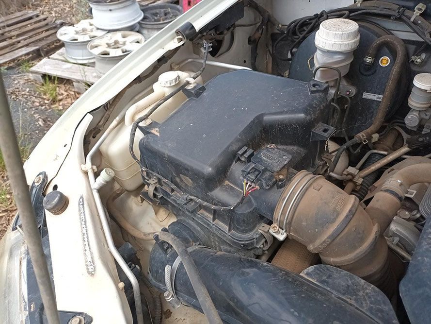 A Close Up of the Engine of a Car With the Hood Open — South West 4WD Wreckers In Brisbane, QLD