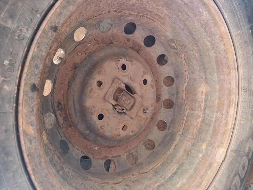 A Close Up of a Rusty Wheel With Holes in It — South West 4WD Wreckers In Brisbane, QLD