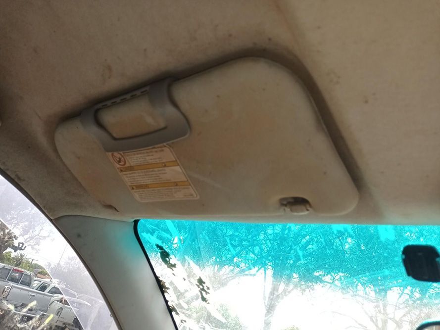 A Sun Visor is Hanging From the Ceiling of a Car — South West 4WD Wreckers In Brisbane, QLD
