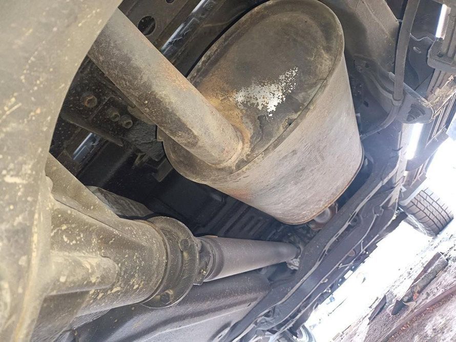 A Close Up of the Underside of a Car With a Exhaust Pipe — South West 4WD Wreckers In Harristown, QLD