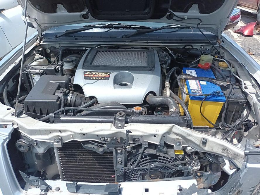 The Engine of a Car is Shown With the Hood Open — South West 4WD Wreckers In Harristown, QLD
