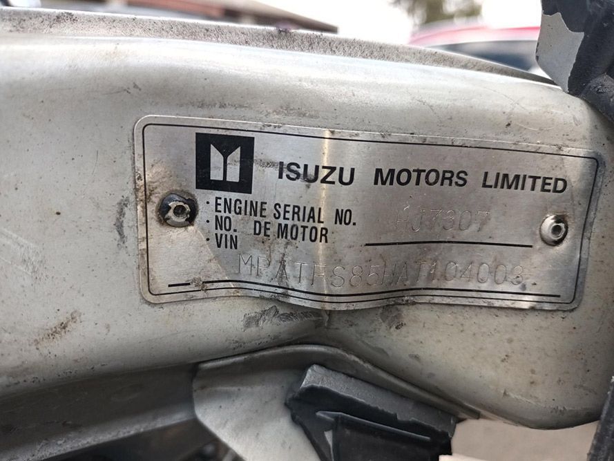 A Close Up of a Isuzu Motors Limited Engine Serial Number — South West 4WD Wreckers In Harristown, QLD