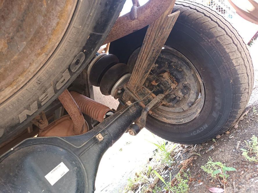 A Close Up of a Truck 's Rear Axle and Tire — South West 4WD Wreckers In Harristown, QLD