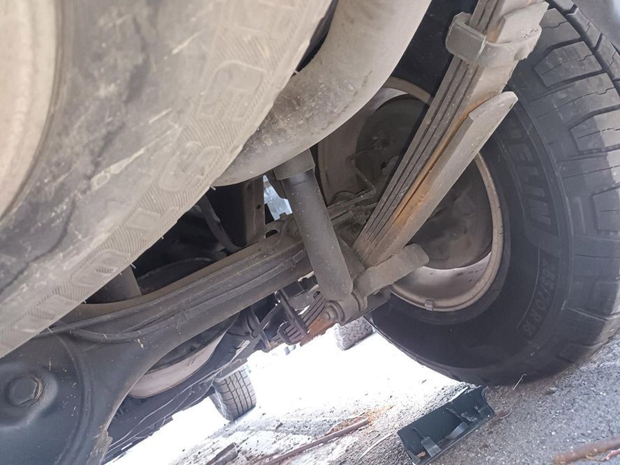 A Close Up of the Underside of a Car With a Tire — South West 4WD Wreckers In Harristown, QLD