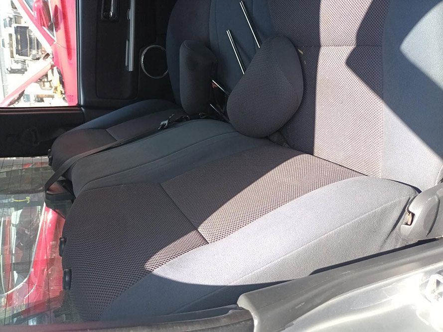 A Car Seat With a Pillow on the Back of It — South West 4WD Wreckers In Harristown, QLD
