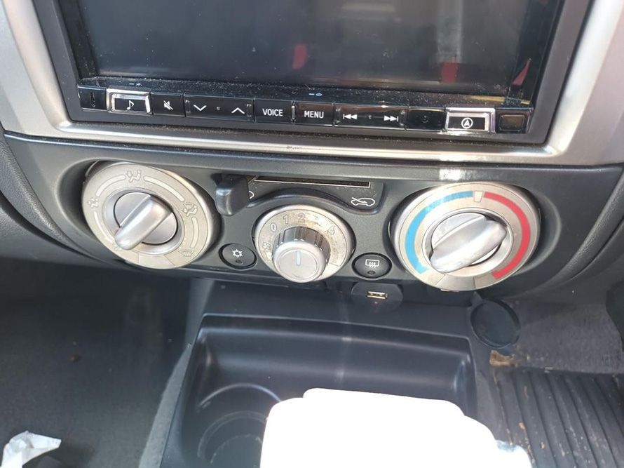A Close Up of a Car 's Climate Control and Radio — South West 4WD Wreckers In Harristown, QLD