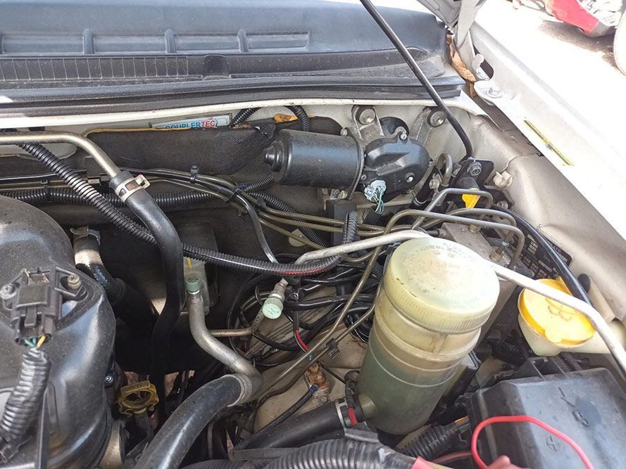 A Close Up of a Car Engine With a Lot of Wires Coming Out of It — South West 4WD Wreckers In Harristown, QLD