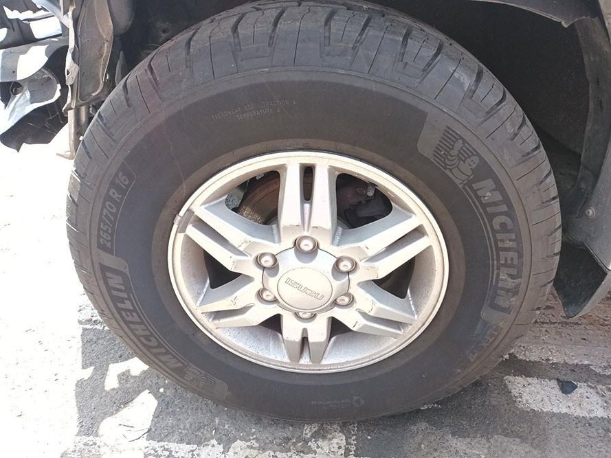 A Close Up of a Tire on a Car Wheel — South West 4WD Wreckers In Harristown, QLD