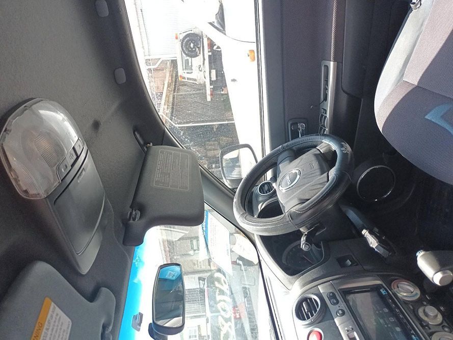 The Inside of a Car With a Steering Wheel and a Sun Visor — South West 4WD Wreckers In Harristown, QLD