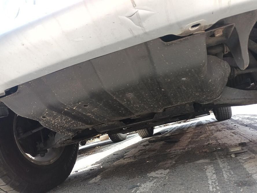 A Close Up of the Underside of a Car With a Damaged Bumper — South West 4WD Wreckers In Harristown, QLD