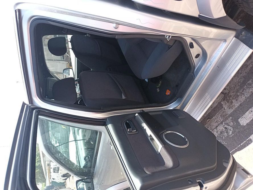 The Back Seat of a Silver Car With the Door Open — South West 4WD Wreckers In Harristown, QLD