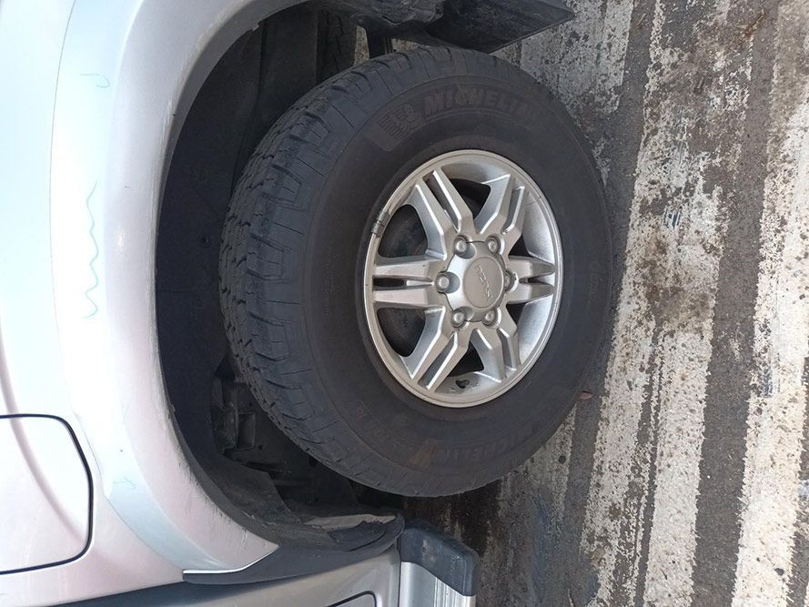 A Close Up of a Tire on the Side of a Car — South West 4WD Wreckers In Harristown, QLD