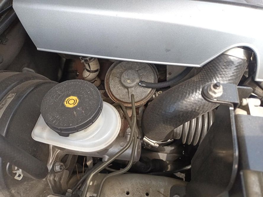 A Close Up of a Car Engine With a Brake Fluid Reservoir — South West 4WD Wreckers In Harristown, QLD