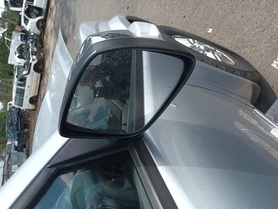 A Silver Car is Parked on the Side of the Road — South West 4WD Wreckers In Harristown, QLD