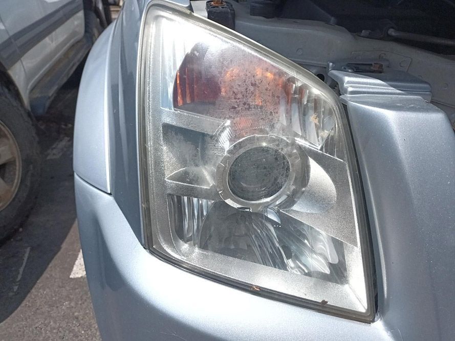 A Close Up of a Car Headlight With the Hood Open — South West 4WD Wreckers In Harristown, QLD